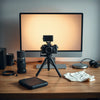Mirrorless camera and creator accessories set up on a desk for photo and video content