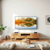 Large 65 inch flat-screen TV in a modern living room with a crisp 4K scene on screen
