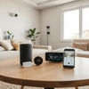 Smart speaker, thermostat, and smart plug arranged for an integrated home automation setup.