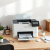 Multifunction printer performing print and scan tasks in a home office setup