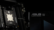 A close-up of an asus computer motherboard.