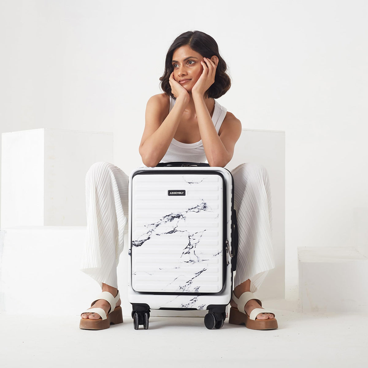 THE ASSEMBLY Hard Shell Spinner Cabin 4 Wheels Trolley Bag With Laptop Compartment (55 Cms) - Premium Polycarbonate Luggage With In-Built Tsa Lock & Usb Port For Flight Travel-Stark, White