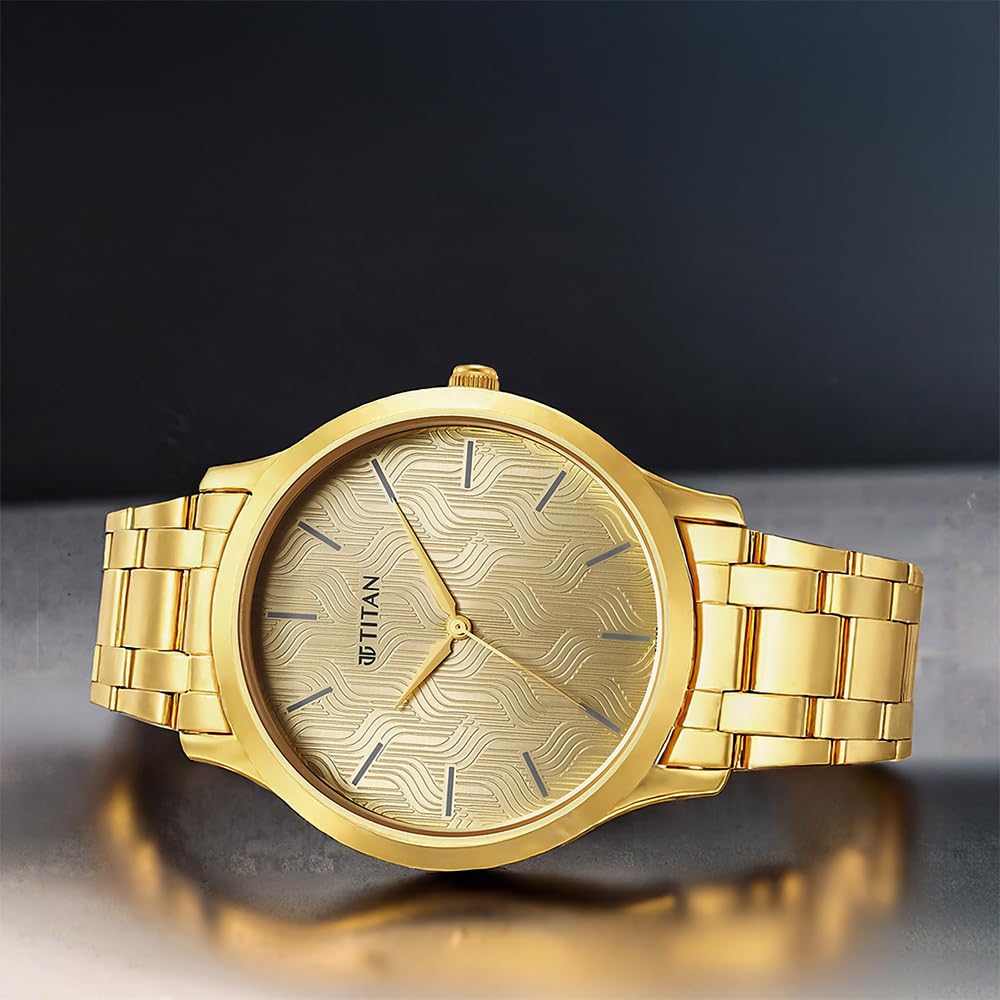 Titan Karishma Quartz Analog Champagne Dial Gold Stainless Steel Strap Watch for Men - NT1825YM03
