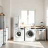 Modern kitchen and laundry area featuring key home appliances like a fridge, washing machine, and dishwasher.