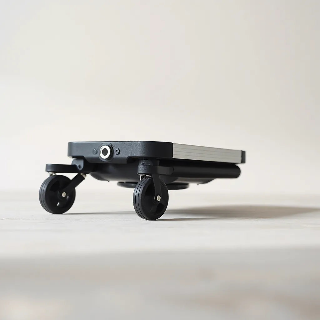 Retractable wheels on a compact rolling device, shown extended and retracted for easy mobility.