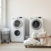 Smart washing machine and dryer in a bright laundry room with neatly folded towels