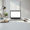 Sleek laptop on a minimal desk with soft natural light, suitable for comparing affordable models