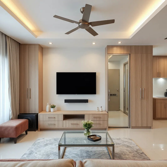 Modern living space with a built-in TV unit, sliding wardrobe, and modular kitchen cabinets in an open layout