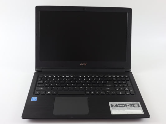 a laptop computer sitting on top of a white table
