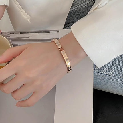 Shining Diva Fashion Latest Stylish Stainless Steel Crystal Gift Bangle Bracelet for Women and Girls (15747b)(Gold) Valentine Gift for Girlfriend 