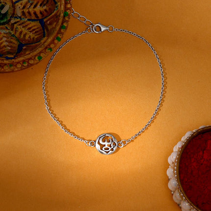 GIVA 925 Silver Sphere Om Rakhi Bracelet with Roli Chawal | Quirky Rakshabandhan Rakhi for Brother | Silver Rakhi for Boys & Men With Certificate of Authenticity and 925 Stamp 