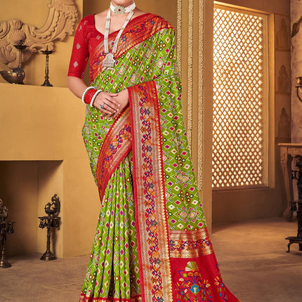 AKHILAM Women's Soft Patola Silk Ikat Print Golden Zari Border Saree With Unstitched Blouse Piece (Green_SMNGLM1002_SS) 