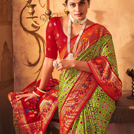 AKHILAM Women's Soft Patola Silk Ikat Print Golden Zari Border Saree With Unstitched Blouse Piece (Green_SMNGLM1002_SS) 