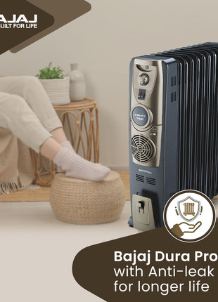 Bajaj Majesty RH 11F Plus Oil Filled Radiator Room Heater with Fan (Black/Golden) - 2500 Watts 
