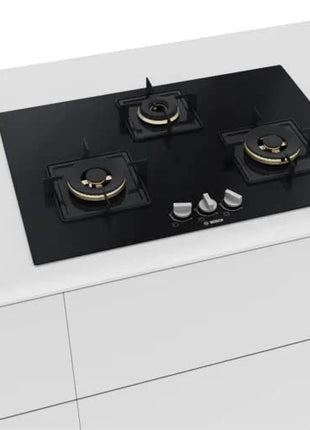 Bosch Built in Gas Hob Black Tempered glass Glass 3 Burner Auto Ignition 75 cm True Brass 2D Ring Burners with Glossy Black Heat Shields & Enameld pan supports (PND7B6F10I) 