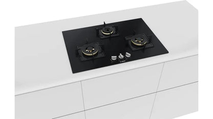 Bosch Built in Gas Hob Black Tempered glass Glass 3 Burner Auto Ignition 75 cm True Brass 2D Ring Burners with Glossy Black Heat Shields & Enameld pan supports (PND7B6F10I) 