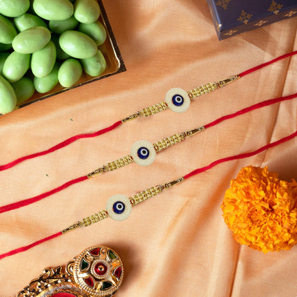 Oriole Gifts Rakhi Hamper for Brother with Premium Evil Eye Rakhi, Chocolate Bites, Almond Brittles, Coffee Almond Nutties, Paan Shots, Snacks & Greeting Card | Rakshabandhan Gift for Brother with Chocolate Gift Box 