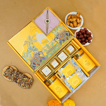 Oriole Gifts Rakhi Hamper for Brother with Premium Evil Eye Rakhi, Chocolate Bites, Almond Brittles, Coffee Almond Nutties, Paan Shots, Snacks & Greeting Card | Rakshabandhan Gift for Brother with Chocolate Gift Box 