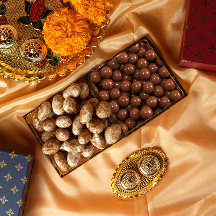 Oriole Gifts Rakhi Hamper for Brother with Premium Evil Eye Rakhi, Chocolate Bites, Almond Brittles, Coffee Almond Nutties, Paan Shots, Snacks & Greeting Card | Rakshabandhan Gift for Brother with Chocolate Gift Box 