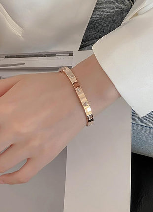 Shining Diva Fashion Latest Stylish Stainless Steel Crystal Gift Bangle Bracelet for Women and Girls (15747b)(Gold) Valentine Gift for Girlfriend 