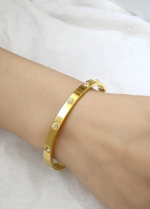 Shining Diva Fashion Latest Stylish Stainless Steel Crystal Gift Bangle Bracelet for Women and Girls (15747b)(Gold) Valentine Gift for Girlfriend 