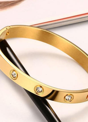 Shining Diva Fashion Latest Stylish Stainless Steel Crystal Gift Bangle Bracelet for Women and Girls (15747b)(Gold) Valentine Gift for Girlfriend 