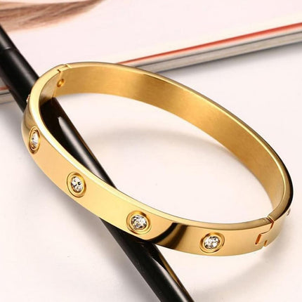 Shining Diva Fashion Latest Stylish Stainless Steel Crystal Gift Bangle Bracelet for Women and Girls (15747b)(Gold) Valentine Gift for Girlfriend 