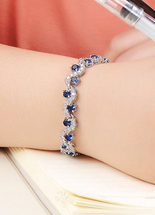 Shining Diva Fashion Royal Blue Crystal CZ Silver Plated Stylish Bracelet Gift for Girls Women(9576b) 