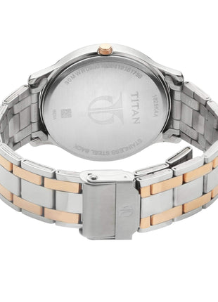 Titan Gents Karishma analog blue-dial watch with two-tone rose-gold and silver stainless steel bracelet.