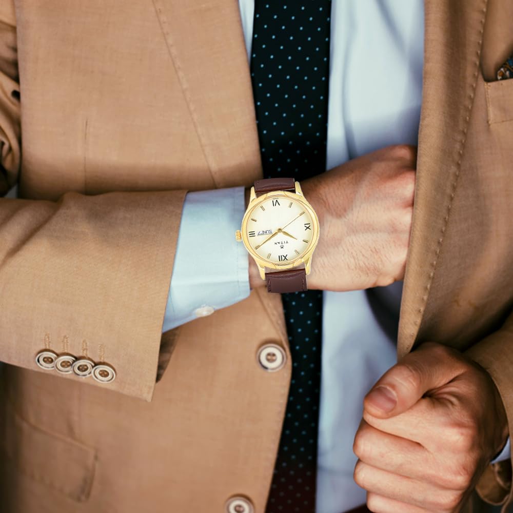 Titan Karishma Analog Champagne Dial Men's Watch NM1580YL05/NN1580YL05/NP1580YL05 