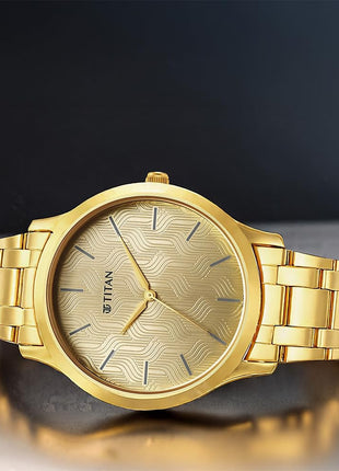 Titan Karishma Quartz Analog Champagne Dial Gold Stainless Steel Strap Watch for Men - NT1825YM03 