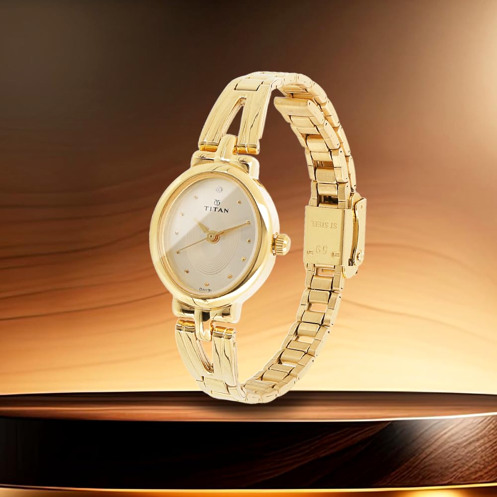 Titan Karishma Revive Analog Champagne Dial Women's Watch-NM2594YM01 / NL2594YM01 