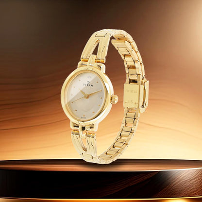 Titan Karishma Revive Analog Champagne Dial Women's Watch-NM2594YM01 / NL2594YM01 