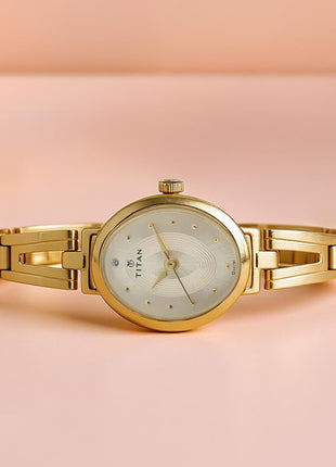 Titan Karishma Revive Analog Champagne Dial Women's Watch-NM2594YM01 / NL2594YM01 