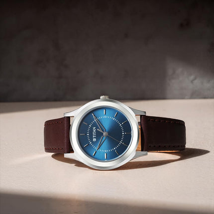Titan Karishma Zing Quartz Analog Blue Dial Brown Leather Strap Watch for Men - 1648SL01 