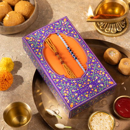 Phool Bandhan Rakhi Giftbox for Brother | 9 Inclusions rakhi gift hamper for brother and bhabhi | 2 Combo Rudraksha & Ocean Gaze Rakhi | Farmley Dry Fruit Mix, Party Mix | Eat Better Millet Namkeen| Guru Chela Mouth Freshener | Greeting Card 