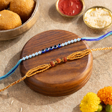 Phool Bandhan Rakhi Giftbox for Brother | 9 Inclusions rakhi gift hamper for brother and bhabhi | 2 Combo Rudraksha & Ocean Gaze Rakhi | Farmley Dry Fruit Mix, Party Mix | Eat Better Millet Namkeen| Guru Chela Mouth Freshener | Greeting Card 